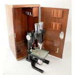 Mid 20th century binocular microscope, by W Watson & Son Ltd. London, no.12357, in fitted case, with