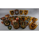 Twenty five various regimental shields, Provenance; this lot is being sold on behalf of the Royal