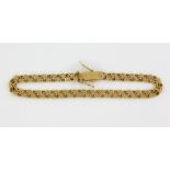 Fancy link chain bracelet to a box clasp with safety catch, stamped 18 ct, length 19 cm . 8.8 grams