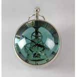 Modern metal mounted magnifying glass ball clock. with Roman numerals and subsidiary seconds dial,