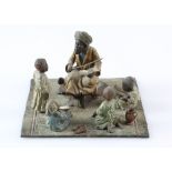Bergman style early 20th century cold painted bronze figure group, the teacher depicting an Arab