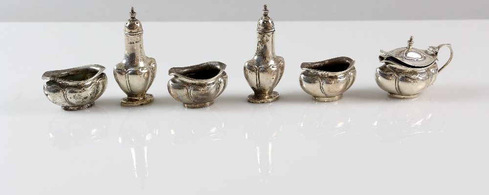 George V silver six piece cruet set, comprising three salts, two pepperettes and a mustard pot and