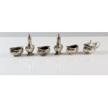 George V silver six piece cruet set, comprising three salts, two pepperettes and a mustard pot and