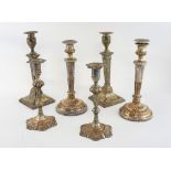 Three pairs of Sheffield silver plated candlesticks.