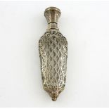 White metal filigree overlaid clear glass scent bottle and cover, 11cm long,.