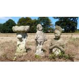 Three composite stone garden ornaments tallest 62cm