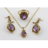 Amethyst jewellery set, oval cut amethyst set in a ring, size R, with similar drop earrings with
