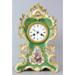 19th century green ground porcelain cased clock with two train movement, 30cm high .