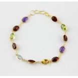 Spectacle set multi gem set bracelet, set with oval cut amethyst, citrine, garnets, peridot and blue