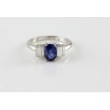 Sapphire and diamond ring, central oval cut sapphire, estimated weight 1.55 carat, set with four