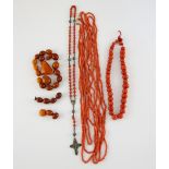 Group of antique coral and amber, one necklace of ovoid beads, largest bead 15 x 10 mm, length 40