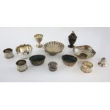 Assorted silver to include shell shaped butter dish London 1821, napkin rings, salts,etc 14 ozs