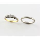Two rings, old cut diamond three stone ring, estimated total diamond weight 0.60 carat, mounted in