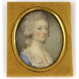 19th century portrait miniature on ivory of a young lady in a blue dress in gilt frame, 5 cm
