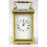 French brass carriage clock in plain case 14cm high overall