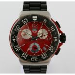Tag Heuer formula 1 chronograph wrist-watch the red dial set with batons and numerals, subsidary