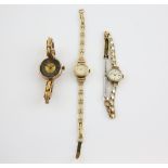 Three gold watches,1960's ladies Tissot, round dial with baton hour markers, 17 jewels mechanical