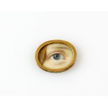 19th century study of a eye in yellow metal oval frame 2cm wide .