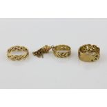 Three gold rings, cut out scroll ring, size R, with a woven tassel ring, size J and plated ring,