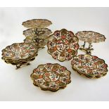 Aynsley Imari pattern scalloped edge dessert service of 12 plates and 5 stands, each with hand-