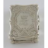 Victorian silver vinaigrette of serpentine form with bright cut decoration, Hilliard & Thomason,