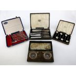 Cased silver dressing table set, another unboxed, and various cased items.