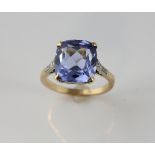 Synthetic blue spinel ring, estimated weight 8.38 carats, with rose cut diamonds shoulders,