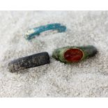 Roman & Byzantine period rings, bronze ring with oval carnelian intaglio depicting a figure, similar