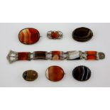 Victorian carved panel agate bracelet, with engraved white metal mounts, measuring approximately