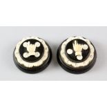 Pair of ebony and ivory games markers, 5 cm diameter,PLEASE NOTE: THIS ITEM CONTAINS OR IS MADE OF
