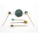 Turquoise set jewellery including an openwork brooch with pearls,in white metal with stamped