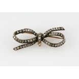 Victorian diamond bow brooch, rose cut diamonds, estimated total diamond weight 0.60 carat,