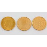 Three half sovereigns, dated 1914 unboxed and 1983, 1989 boxed .