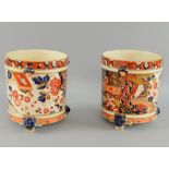 Pair of Old Derby Imari pattern cache pots, each on three lion-mask feet, 20 cm high, (2) .