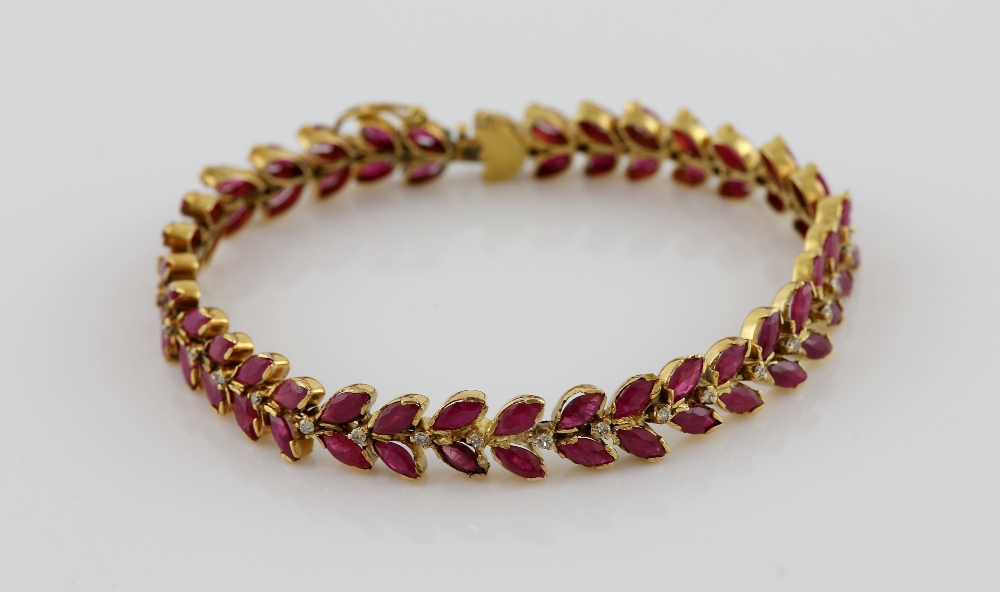 Ruby and diamond bracelet, marquise cut rubies and round brilliant cut diamonds, with a concealed