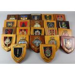 Twenty five various regimental shields, Provenance; this lot is being sold on behalf of the Royal