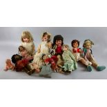 Early 20th century Bisque headed doll, two felt headed dolls, and other dolls