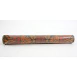 A roll of hand printed wallpaper, with dark and light orange paint on brown paper, possibly Heals,