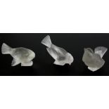 Three Lalique models of birds, each on square section base, one with engraved signature and two with