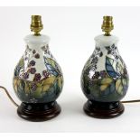 A pair of Moorcroft lamp bases of baluster form in blackberry bramble pattern, 20 cm excluding