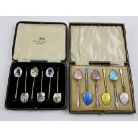 Walker & Hall, a set of enamelled tea spoons, each one painted with a land or seascape, silver