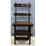 Oak metamorphic library chair with pierced gothic reform decoration C 1900 .