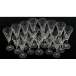 Set of drinking glasses, C 1930, with facetted bowls, eight 18 cm high, eight 14 cm high and three