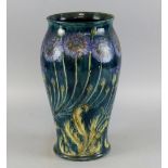 S Hancock & Sons Morris Ware vase, designed by George Cartlidge, decorated with purple flowers, on a