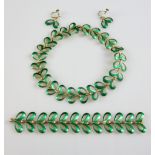 Norwegian enamel jewellery set by Albert Scharning, including looped green enamel necklace, bracelet