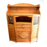 Side cabinet bookshelf in oak with leaded stained glass panels, Art Nouveau style carved fruit and