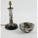 Moorcroft a candlestick form lamp base in blackberry bramble pattern, 21 cm excluding fittings and a