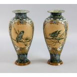 Florence Barlow for Doulton Lambeth, a pair of pate-sur-pate decorated stoneware vases, panels