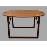 Svend Langkilde (Danish) - A 1960’s teak and brass mounted butler’s tray table, manufacturer’s marks