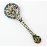 Norwegian plique-à-jour spoon with formal decoration of red and pink flowers in Art Nouveau